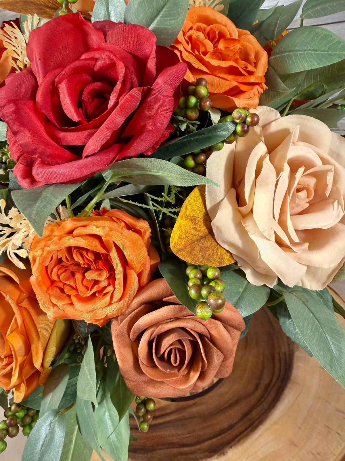 Handmade Floral Arrangement – Red & Orange Roses, Rustic Wooden Barrel