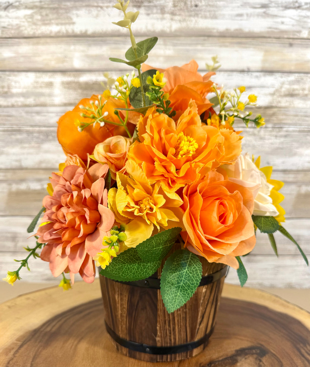 Handmade Floral Arrangement – Orange & Yellow Flowers, Rustic Wooden Barrel