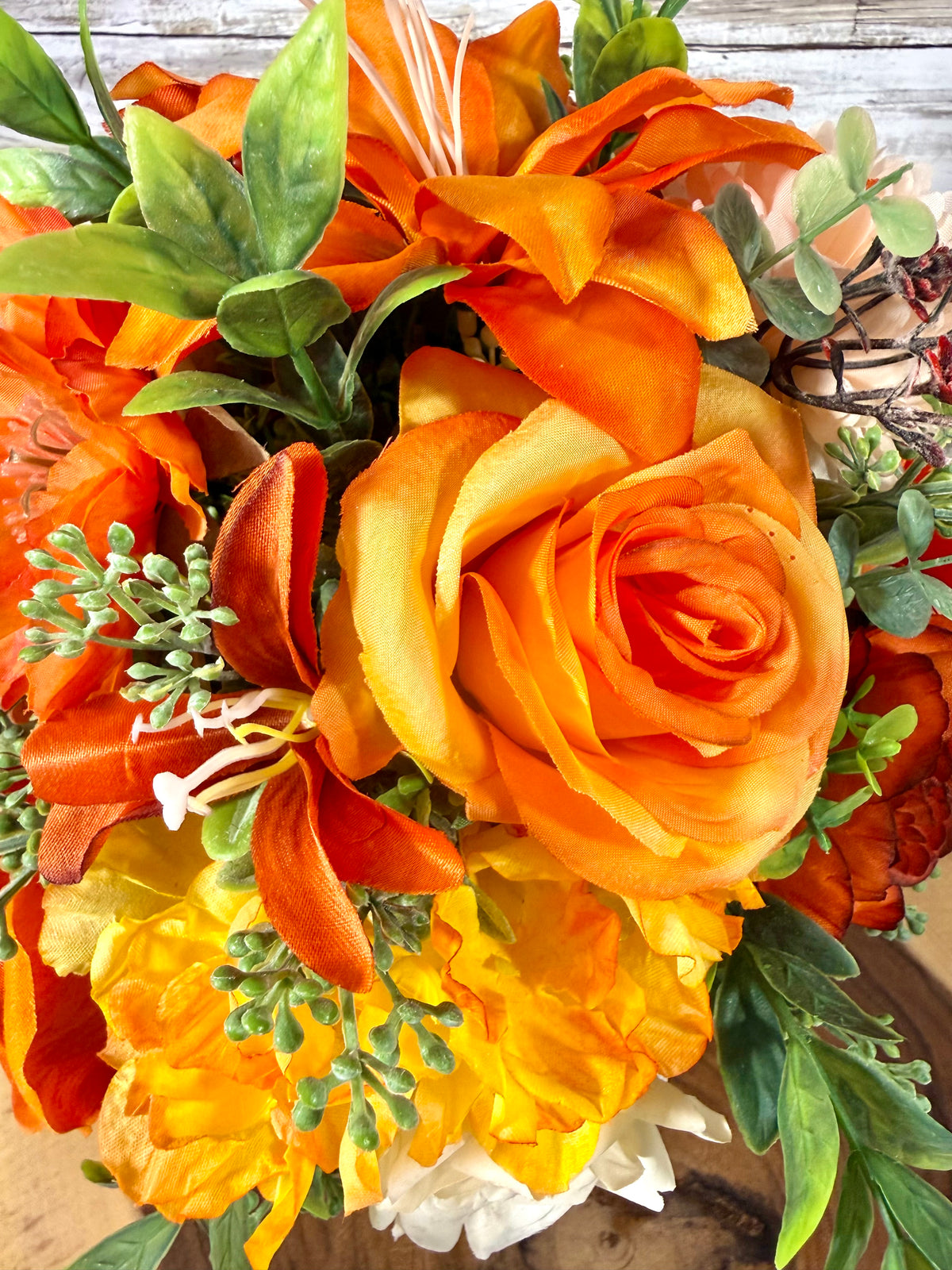 Orange & Yellow Floral Arrangement in Teal Metal Bucket