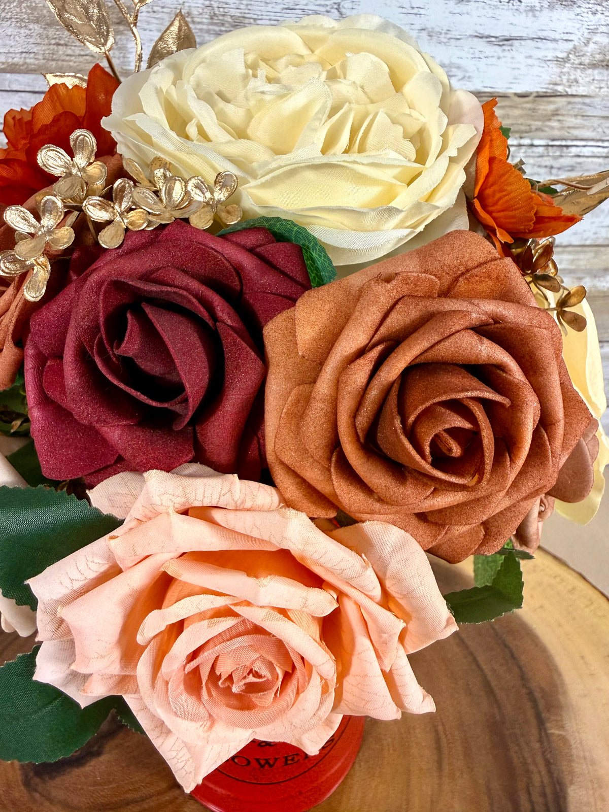 Peach & Burgundy Floral Arrangement in Red Metal Container