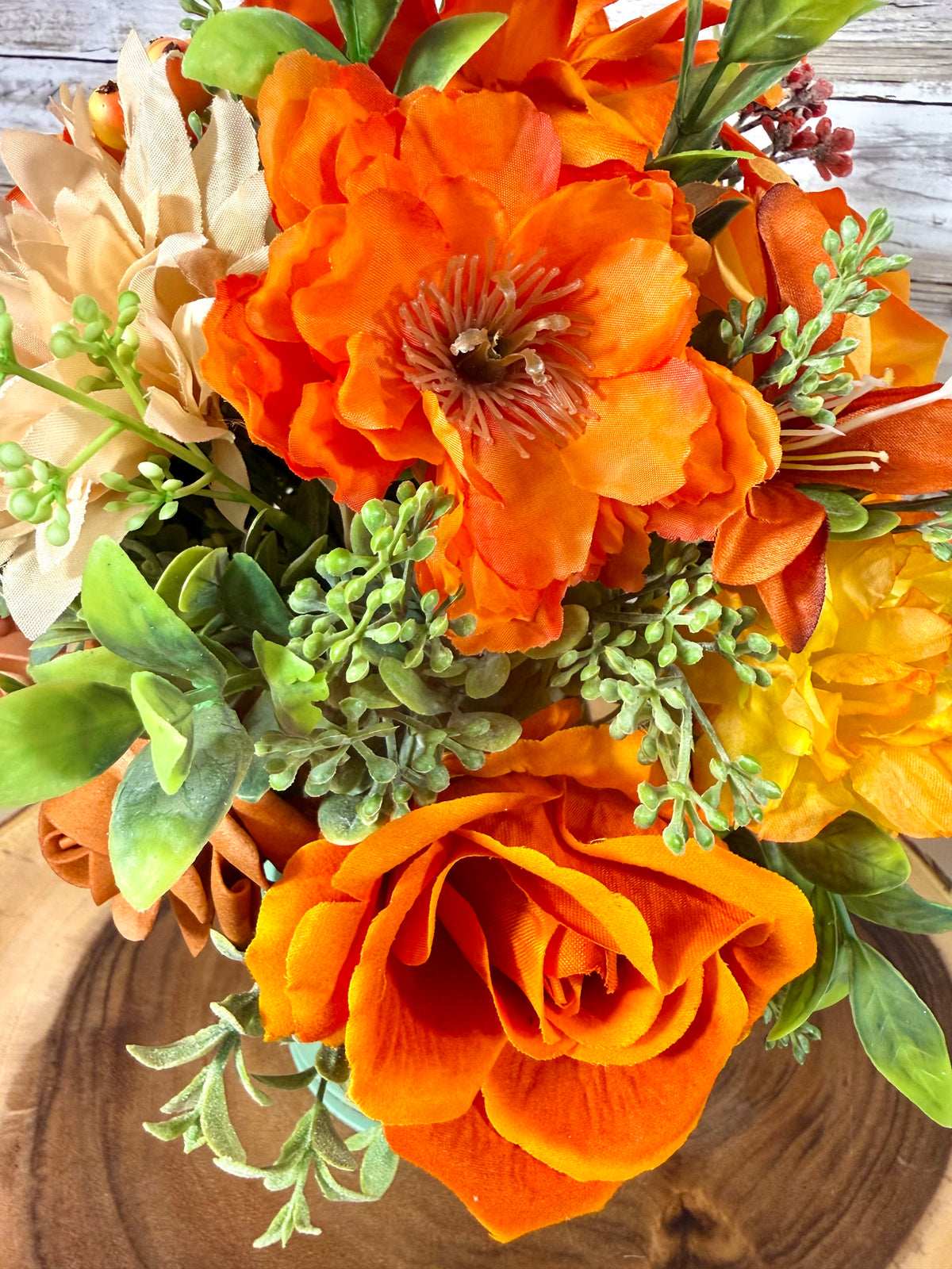Orange & Yellow Floral Arrangement in Teal Metal Bucket