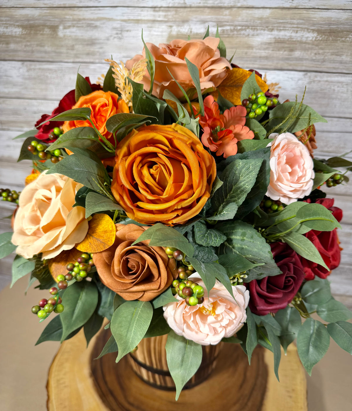 Handmade Floral Arrangement – Red & Orange Roses, Rustic Wooden Barrel