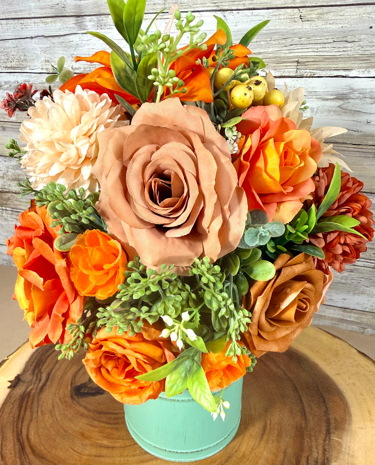 Orange & Yellow Floral Arrangement in Teal Metal Bucket